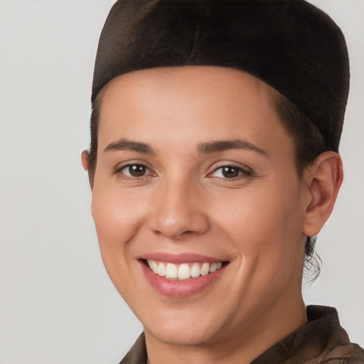 Joyful white young-adult female with short  brown hair and brown eyes