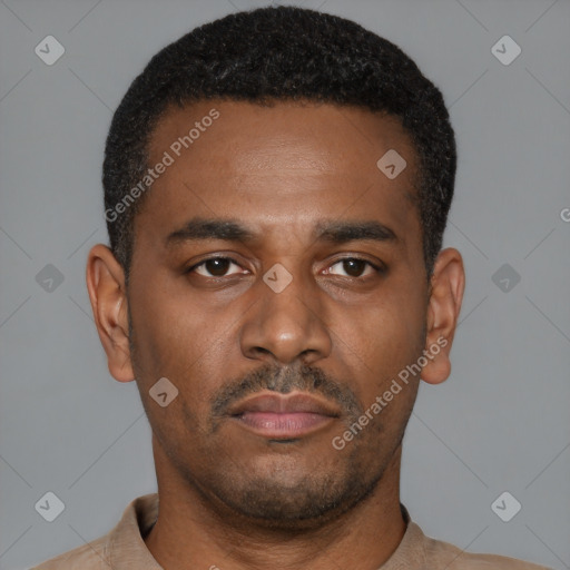 Neutral latino young-adult male with short  black hair and brown eyes