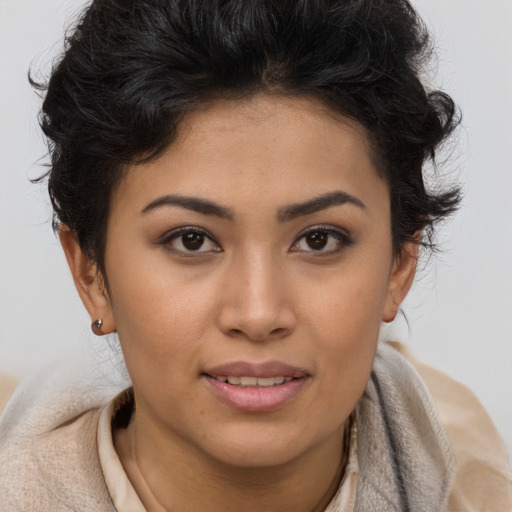 Joyful asian young-adult female with short  brown hair and brown eyes