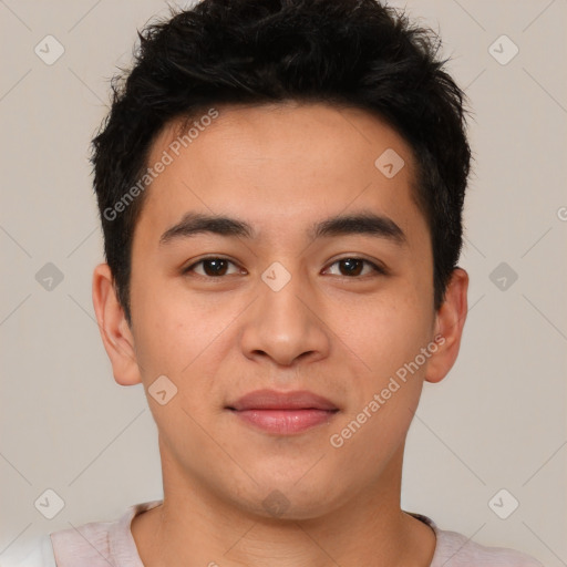 Joyful asian young-adult male with short  brown hair and brown eyes