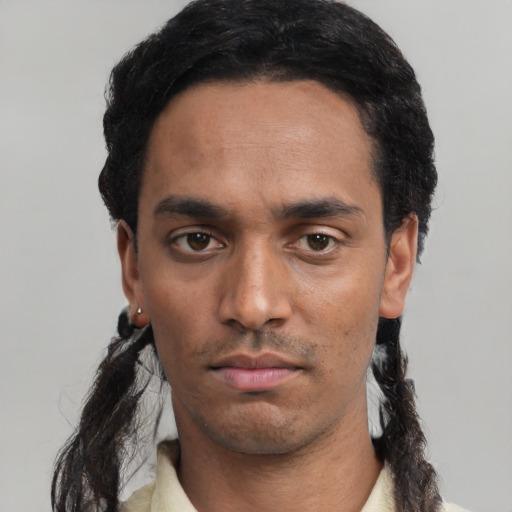 Neutral black young-adult male with short  black hair and brown eyes