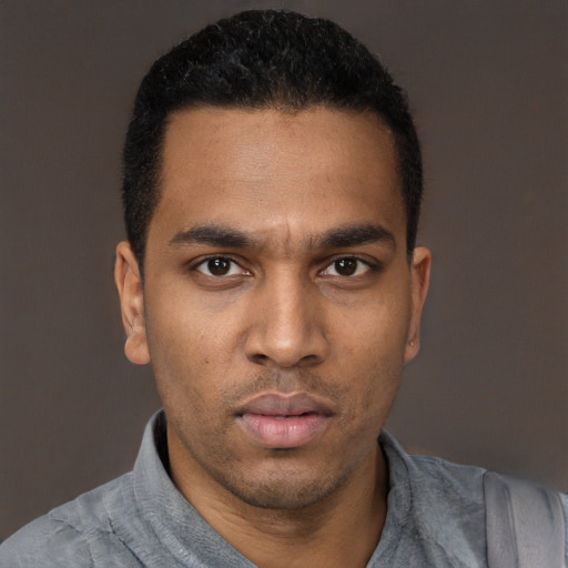 Neutral black young-adult male with short  black hair and brown eyes