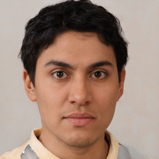 Neutral latino young-adult male with short  brown hair and brown eyes