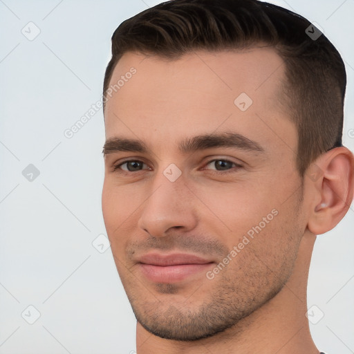 Joyful white young-adult male with short  brown hair and brown eyes