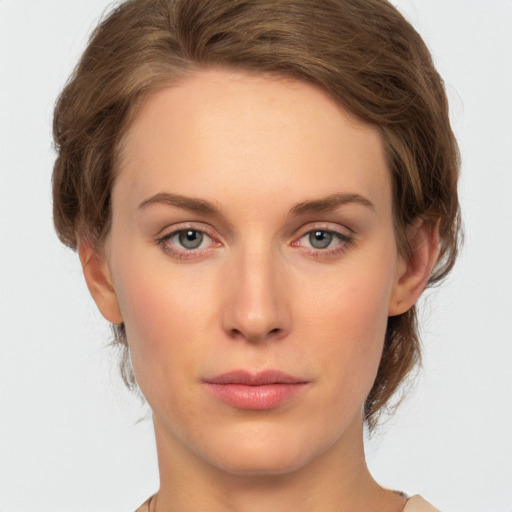 Neutral white young-adult female with medium  brown hair and green eyes