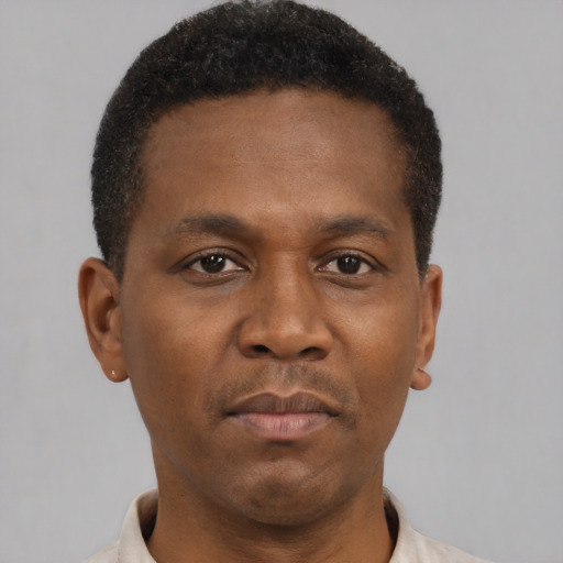 Neutral black young-adult male with short  brown hair and brown eyes
