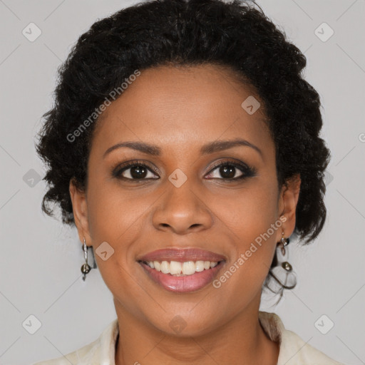 Joyful black young-adult female with long  brown hair and brown eyes