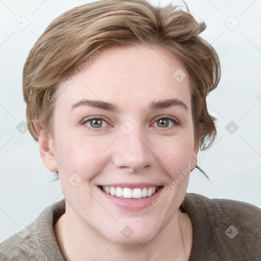 Joyful white young-adult female with short  brown hair and blue eyes