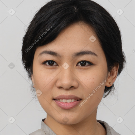 Joyful asian young-adult female with medium  black hair and brown eyes