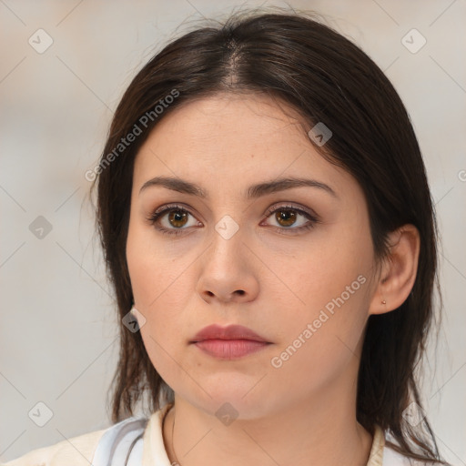 Neutral white young-adult female with medium  brown hair and brown eyes