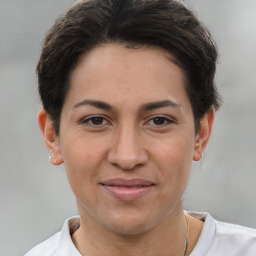 Joyful white adult female with short  brown hair and brown eyes