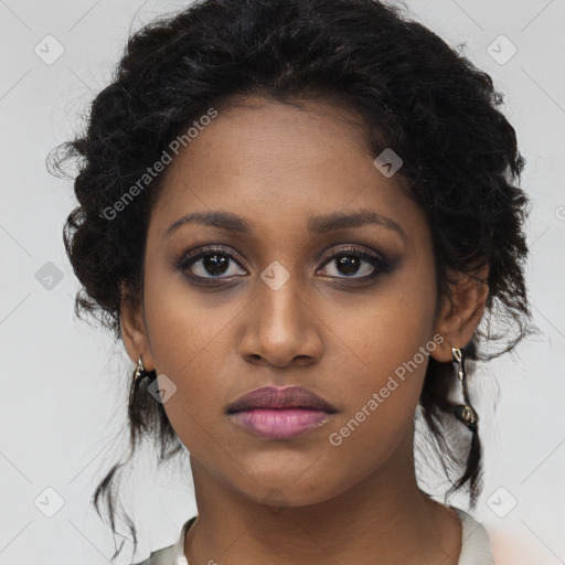 Neutral black young-adult female with medium  black hair and brown eyes