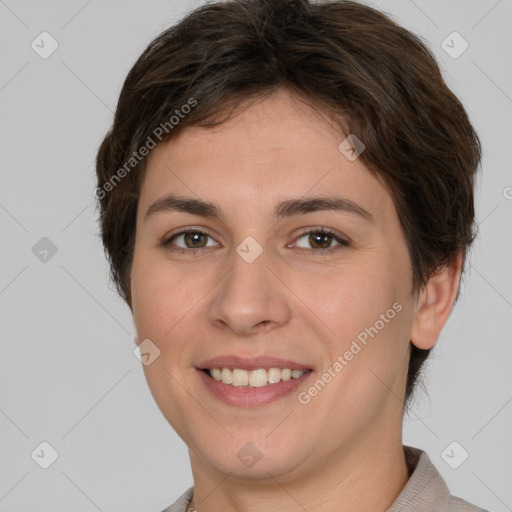 Joyful white young-adult female with short  brown hair and brown eyes