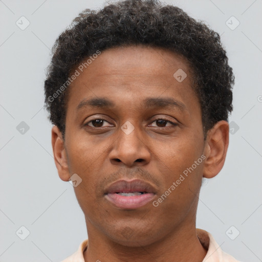 Neutral black adult male with short  brown hair and brown eyes