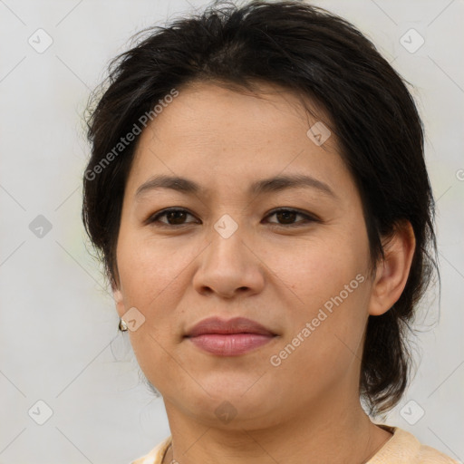 Joyful asian young-adult female with medium  brown hair and brown eyes