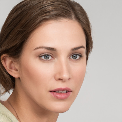 Neutral white young-adult female with medium  brown hair and grey eyes