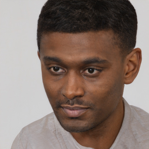 Neutral black young-adult male with short  brown hair and brown eyes