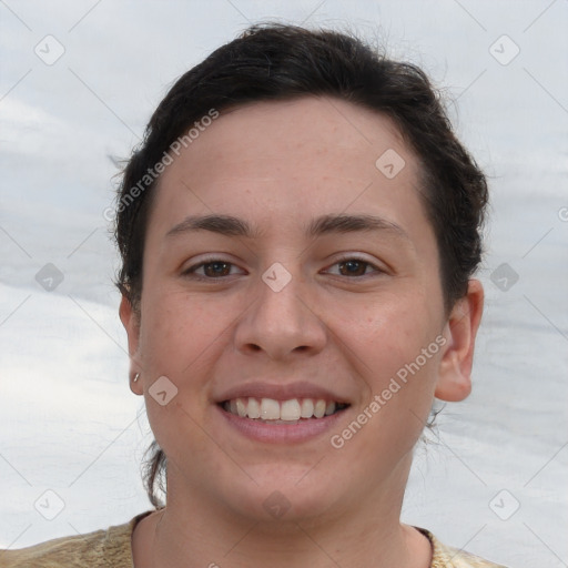 Joyful white young-adult female with short  brown hair and brown eyes