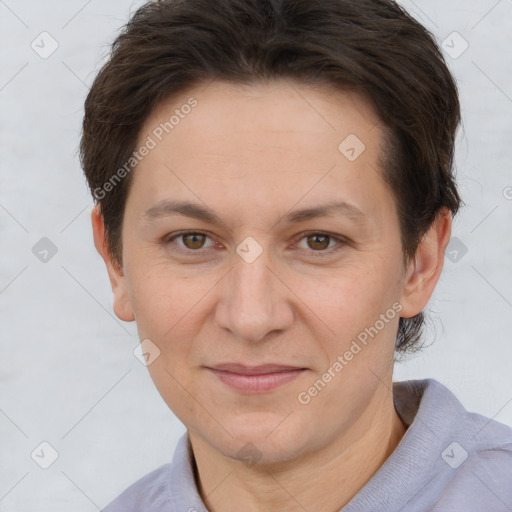 Joyful white adult female with short  brown hair and brown eyes