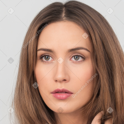 Neutral white young-adult female with long  brown hair and brown eyes