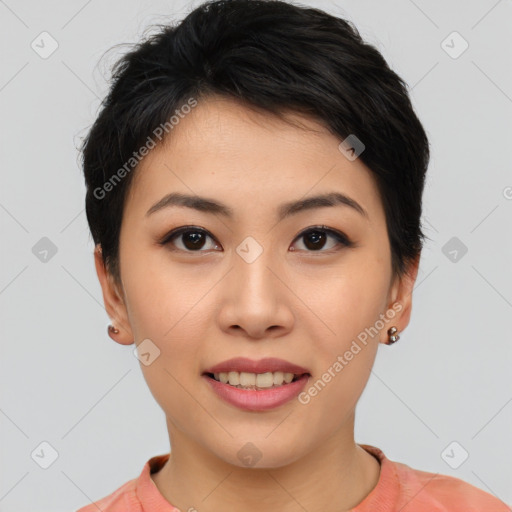 Joyful asian young-adult female with short  black hair and brown eyes