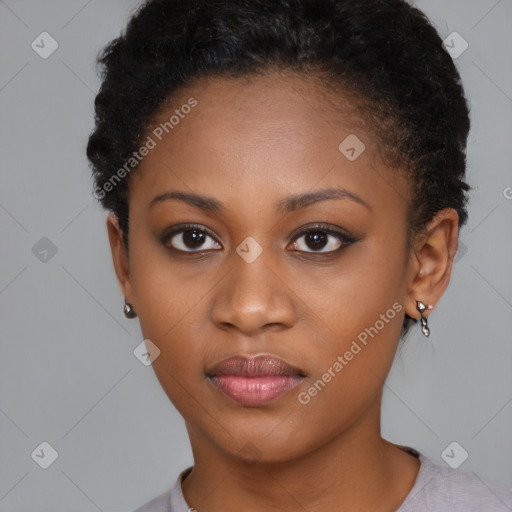 Neutral black young-adult female with short  brown hair and brown eyes