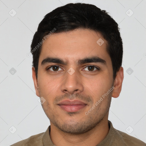 Neutral latino young-adult male with short  black hair and brown eyes