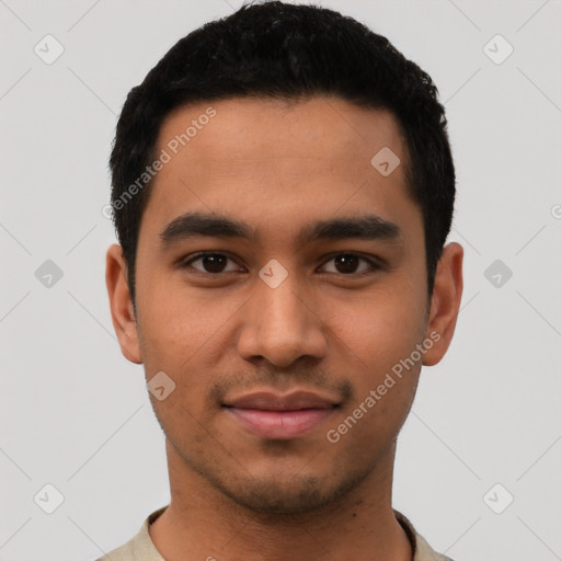 Joyful latino young-adult male with short  black hair and brown eyes