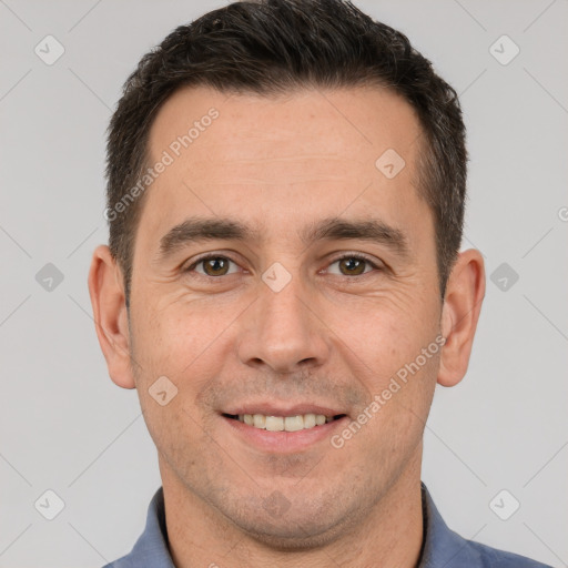 Joyful white adult male with short  brown hair and brown eyes