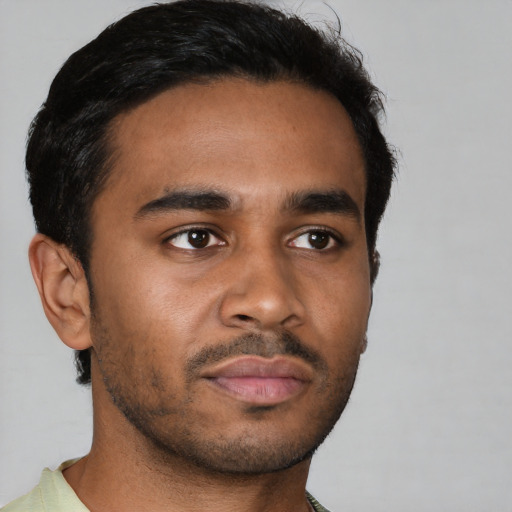 Neutral black young-adult male with short  brown hair and brown eyes