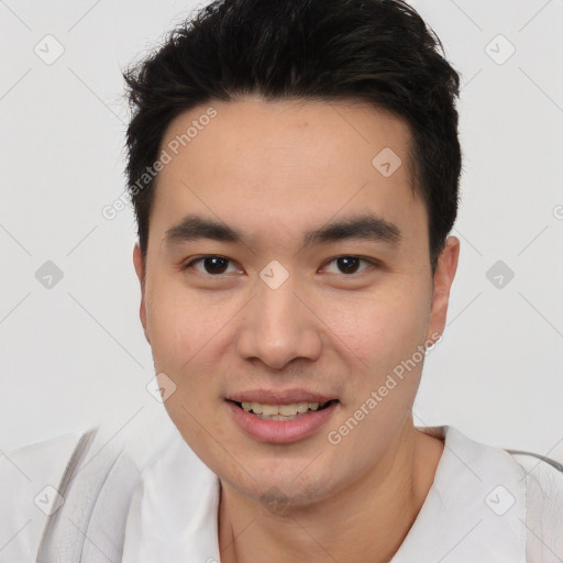 Joyful white young-adult male with short  black hair and brown eyes