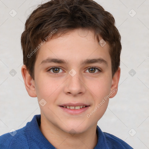 Joyful white child male with short  brown hair and brown eyes