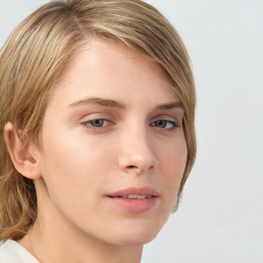 Neutral white young-adult female with medium  brown hair and grey eyes