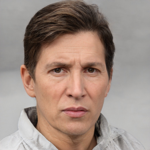 Neutral white adult male with short  brown hair and brown eyes