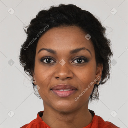 Joyful black young-adult female with long  black hair and brown eyes