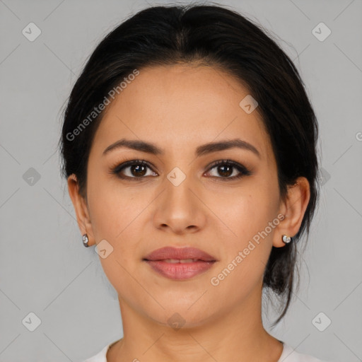 Joyful latino young-adult female with medium  brown hair and brown eyes