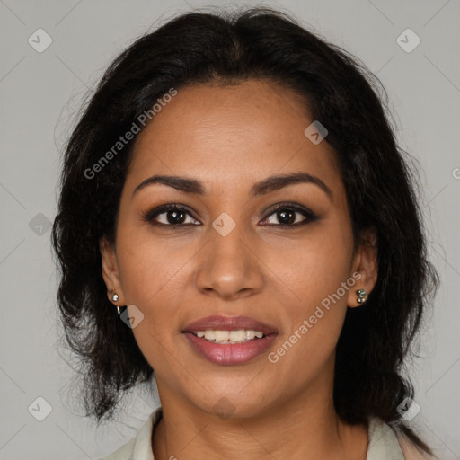 Joyful latino young-adult female with medium  brown hair and brown eyes