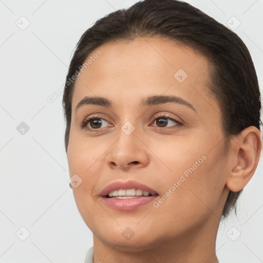 Joyful white young-adult female with short  brown hair and brown eyes