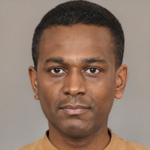Neutral black young-adult male with short  black hair and brown eyes