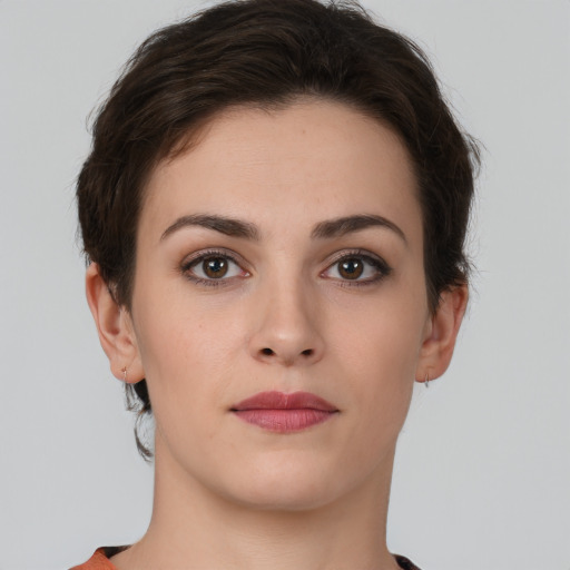 Neutral white young-adult female with short  brown hair and brown eyes