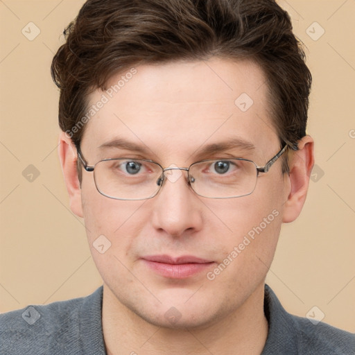 Joyful white adult male with short  brown hair and grey eyes