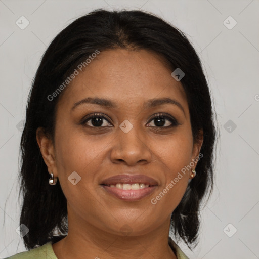 Joyful black adult female with medium  brown hair and brown eyes