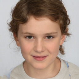 Joyful white child female with medium  brown hair and grey eyes