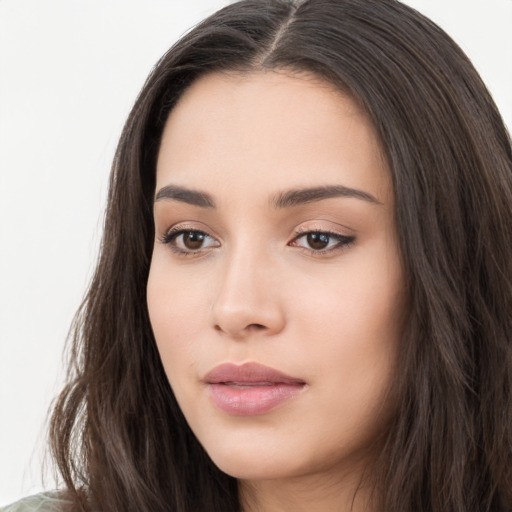 Neutral white young-adult female with long  brown hair and brown eyes