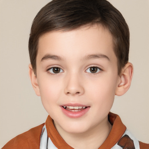 Joyful white child male with short  brown hair and brown eyes