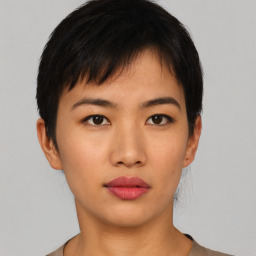 Neutral asian young-adult female with short  black hair and brown eyes