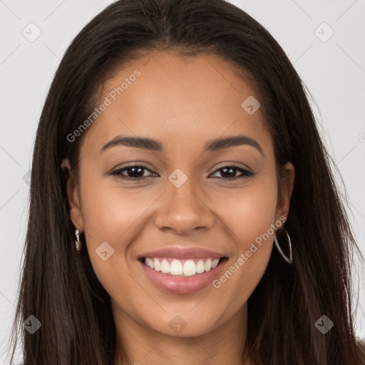 Joyful latino young-adult female with long  brown hair and brown eyes