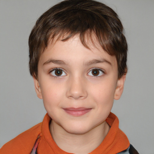 Joyful white child female with short  brown hair and brown eyes