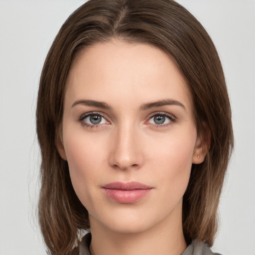 Neutral white young-adult female with medium  brown hair and grey eyes