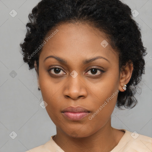 Joyful black young-adult female with medium  black hair and brown eyes